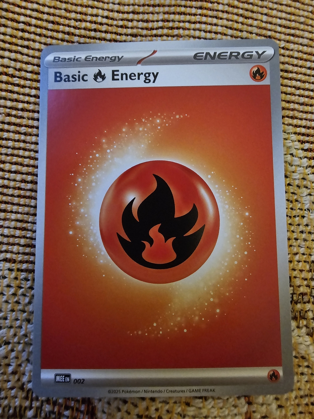Basic Fire Energy card (Number 002) from the modern Scarlet & Violet era